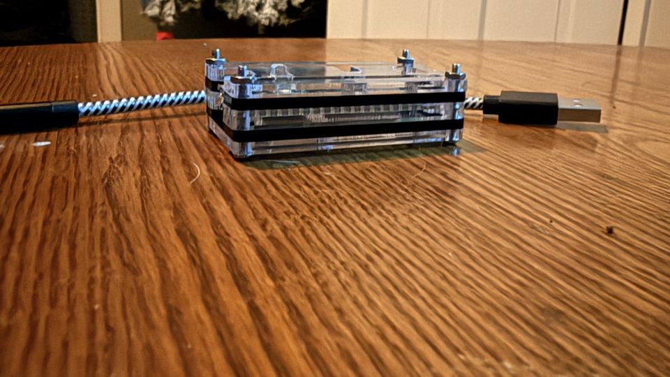My BadUSB from the side, cased up with its braided USB cable