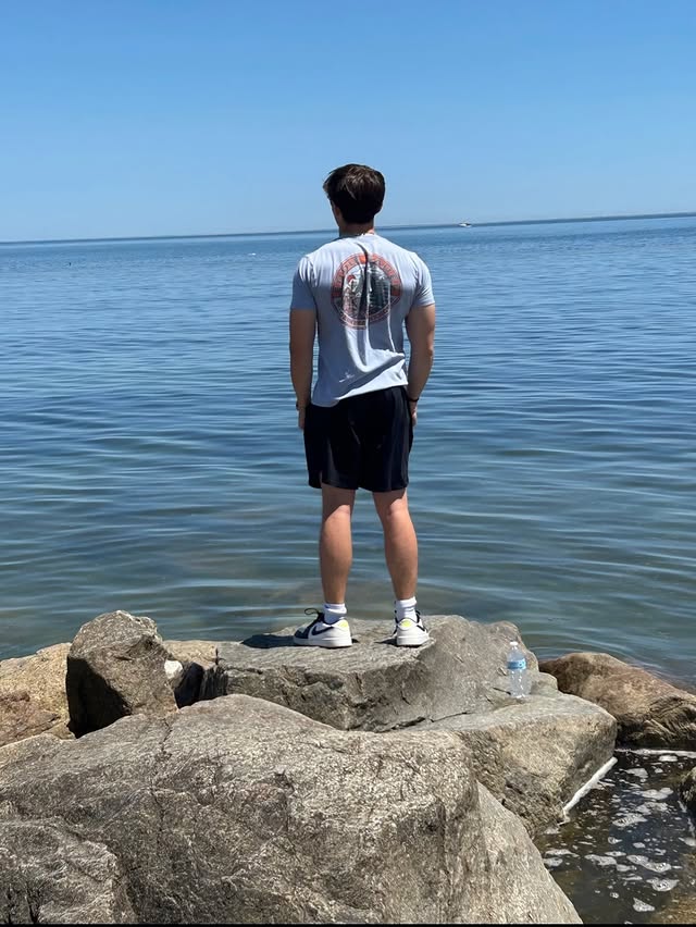 By the water